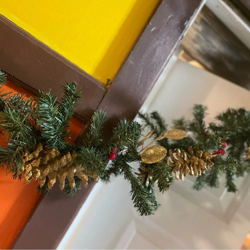 9 foot gold and silver faux evergreen garland, pine cones, berries